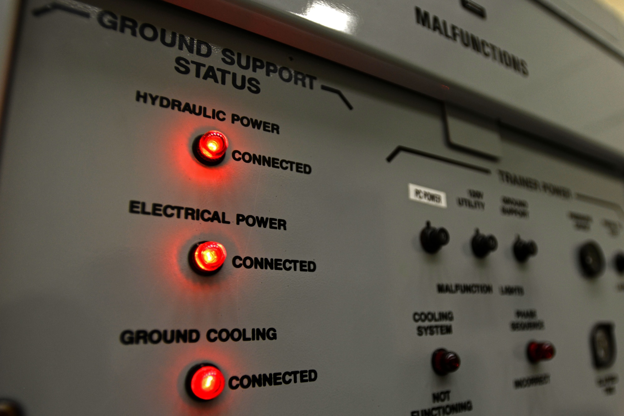 Lights on a panel indicate power is connected during a gun hydraulic bleed and leak test on a mock F-16CM Fighting Falcon body during training at the 372nd Training Squadron, Detachment 202 F-16 Field Training Detachment at Shaw Air Force Base, S.C., April 25, 2017. The operational check ensures the gun functions properly after its removal and reinstallation. (U.S. Air Force photo by Senior Airman Kelsey Tucker)