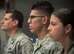 Senior Airman Kyle Belmares (center), 96th Communications Squadron cable and antenna systems, stands alongside Airman 1st Class Jaylyn Smith (right) and his squadron commander, Lt. Col. Matthew Imperial, during an awards ceremony June 20 on Eglin Air Force Base, Fla. Belmares and Smith were awarded Air Force Commendation Medals for life-saving care in response to a severe vehicle accident in February. (U.S. Air Force photo/Jasmine Porterfield)