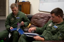 U.S. Air Force Reserve Senior Airman Kyle Crafts and Tech Sgt. Derek Johnson conduct a safety briefing before a training sortie June 15, 2017, at Little Rock Air Force Base, Ark. Both Airmen are loadmasters assigned to the 327th Airlift Squadron, and were part of the first all Reserve 3-ship training mission flown by the 913th Airlift Group. (U.S. Air Force photo by Master Sgt. Jeff Walston/Released)