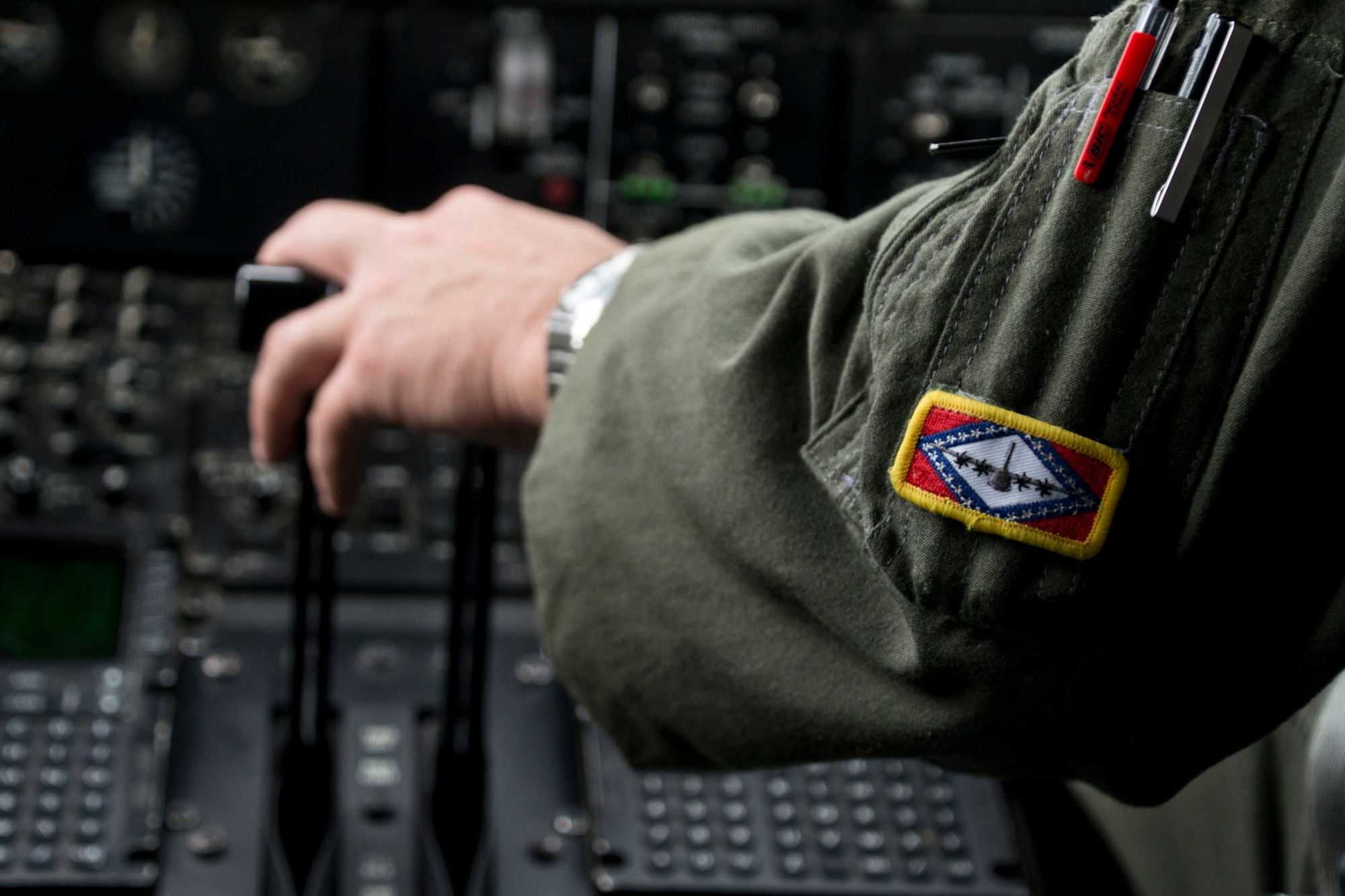 U.S. Air Force Reserve Lt. Col. Chris Dickens, assistant operations officer, 327th Airlift Squadron, takes control of a C-130J Super Hercules throttle during a flight near Little Rock Air Force Base, Ark., June 15, 2017. Dickens was part of the 913th Airlift Group’s first 3-ship mission manned entirely by Reserve Airmen. (U.S. Air Force photo by Master Sgt. Jeff Walston/Released)