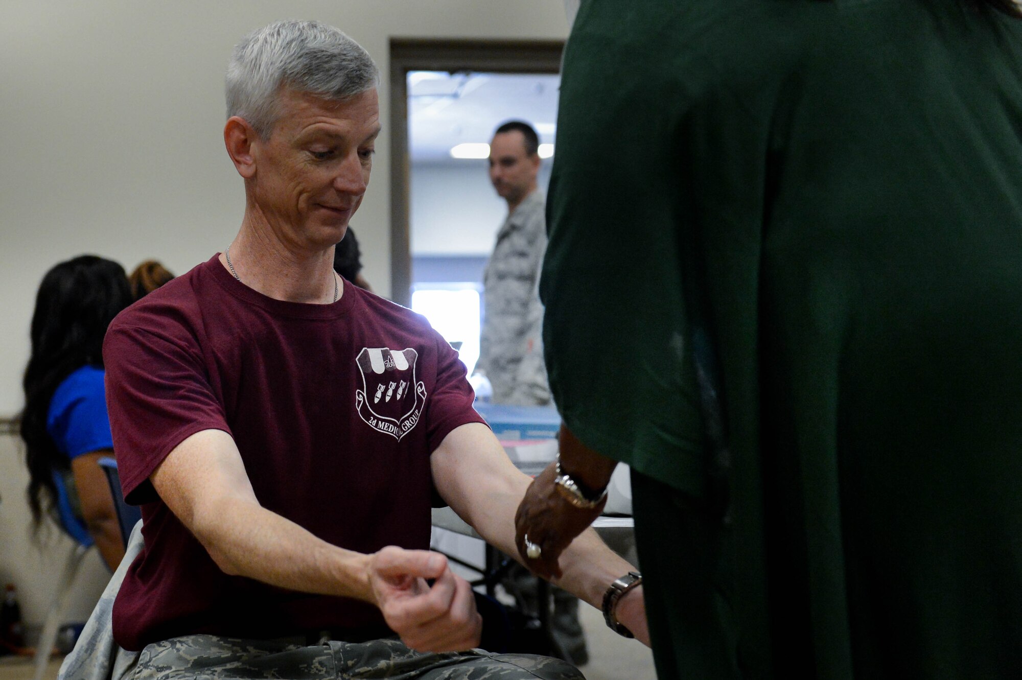 Col. Robert Kent, 2nd Medical Group commander, prepares to give blood at the 2017 LifeShare Blood Drive at Barksdale Air Force Base, La., June 16, 2017. Only 38 percent of the United States population is able to donate blood, and only 10 percent of the population does so. (U.S. Air Force Photo/Airman 1st Class Sydney Bennett)