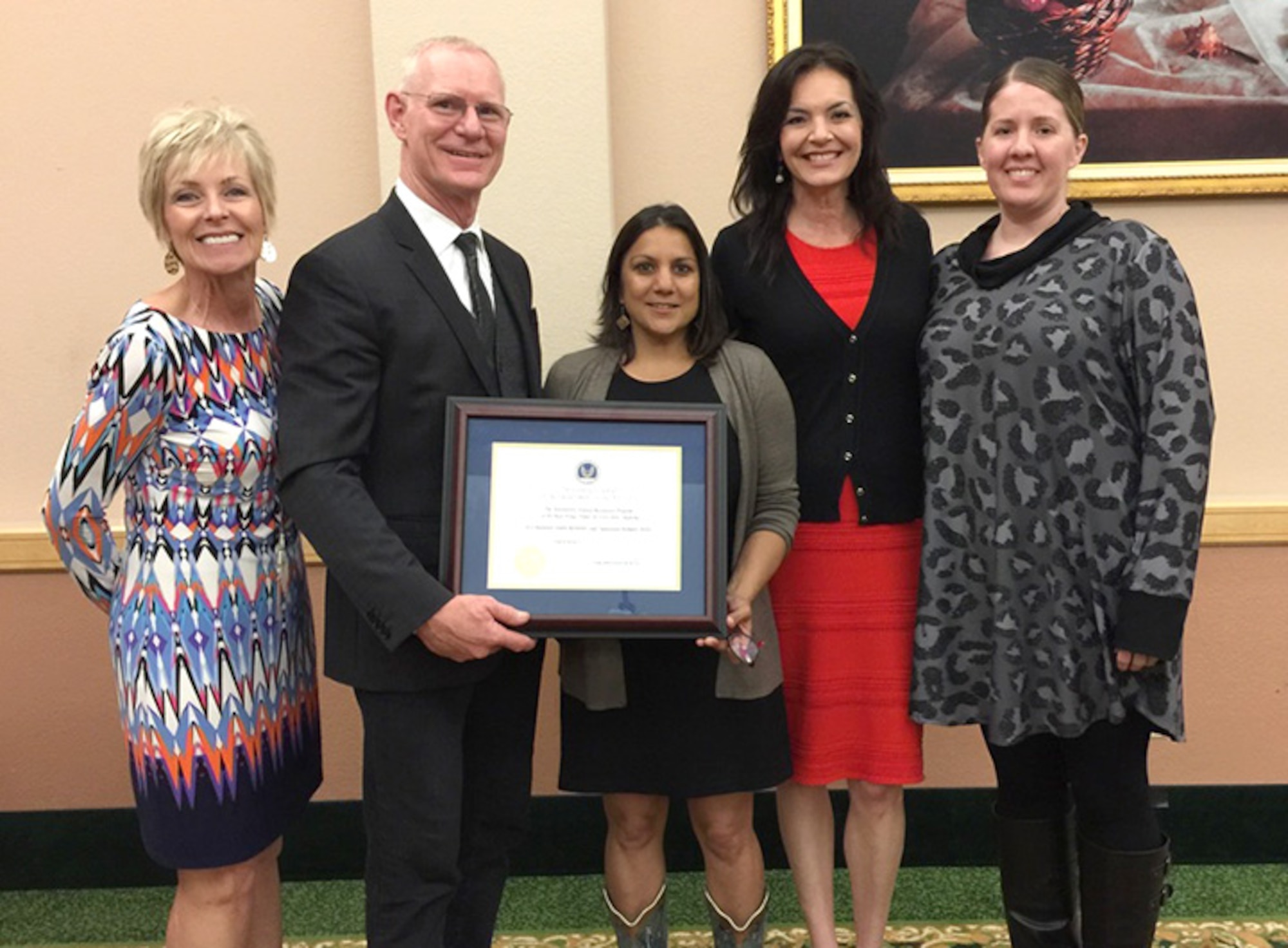 Mala Malhotra-Ortiz, center, associate general counsel and director of the Air Force’s Conflict Resolution Division, stands with members of the Tinker Air Force Base Alternative Dispute Resolution Office May 10 after presenting the General Counsel’s Conflict Management/ADR Award in San Antonio. The Air Force-level award went to, from left, 72nd ABW ADR Specialist Debbie Patterson, ADR Program Manager Terry Hirons, ADR Specialist Kelli Anderson, and ADR Administrator Katie Nowell. (Courtesy photo)