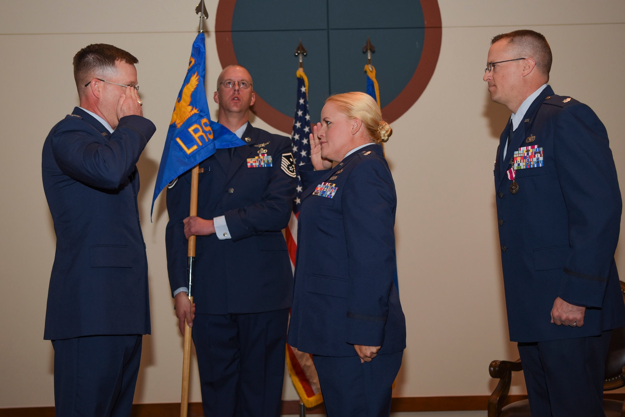Lt. Col. Danielle R. Kirk, 460th Logistics Readiness Squadron incoming commander, renders her first salute to her new commander, Col. Shawn Thompson, 460th Mission Support Group commander, during her change of command June 23, 2017, on Buckley Air Force Base, Colo.  Kirk is now the commander of a squadron that provides logistics support for over 6,000 personnel. (U.S. Air Force photo by Airman 1st Class Holden S. Faul/ released)