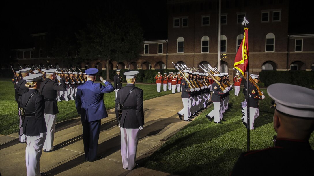 Marching Companies with Marine Barracks Washington D.C. conduct “pass in review” during a Friday Evening Parade at the Barracks, June 23, 2017. The guest of honor for the parade was Lt. Gen. Thomas Trask, vice commander, United States Special Operations Command, and the hosting official was Lt. Gen. James Laster, director, Marine Corps Staff. (Official Marine Corps photo by Lance Cpl. Damon McLean/Released)