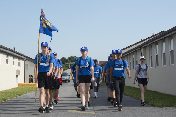 Junior ROTC cadets march during the Delaware Cadet Leadership Course June 21, 2017, at the Delaware National Guard training site at Bethany Beach, Del. The cadets honed their drill techniques throughout the week by marching to each class and event. (U.S. Air Force photo by Staff Sgt. Jared Duhon)