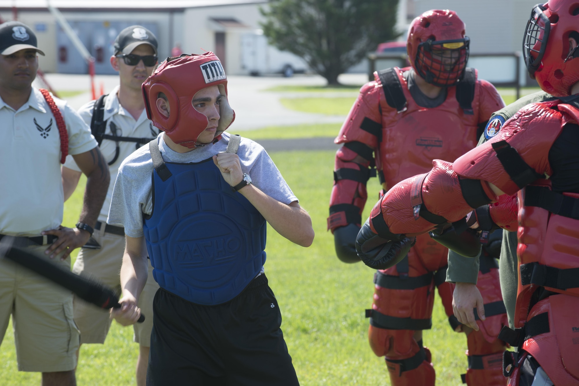 Ravens assigned to the 436th Security Forces Squadron, known for providing security for aircraft and aircrews in a deployed location, instruct baton fighting techniques during the Delaware Cadet Leadership Course June 21, 2017, at the Delaware National Guard training site at Bethany Beach, Del. During the training, cadets had the option to fight a ‘red man’ using the techniques learned that day. (U.S. Air Force photo by Staff Sgt. Jared Duhon)