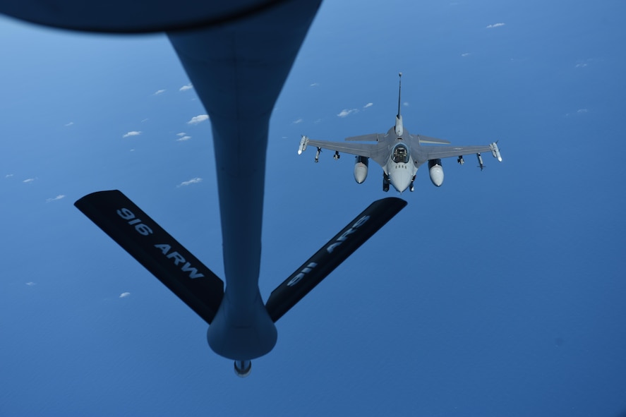 A KC-135R Stratotanker prepares to refuel an F-16 Fighting Falcon during Exercise Razor Talon, June 8, 2017, over the Atlantic Ocean.  During the exercise, 10 cadets from the U.S. Air Force Academy experienced firsthand how the boom operator performs.  (U.S. Air Force photo by Airman 1st Class Miranda A. Loera)