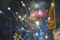 Airman 1st Class Wayne Lee, 628th Civil Engineer Squadron structural apprentice, welds an angle iron for a table leg at Joint Base Charleston, S.C., June 23, 2017. The 628th CES is also responsible for fabricating and repairing components of buildings, utility systems and property equipment.