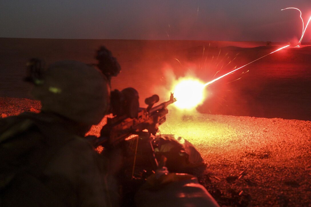 A Marine fires a tracer round from an M240L machine gun during a night live-fire range at Camp Shorabak, Afghanistan, June 25, 2017. The Marine is assigned to Task Force Southwest, which works to train, advise and assist the Afghan army and national police. Marine Corps photo by Sgt. Lucas Hopkins