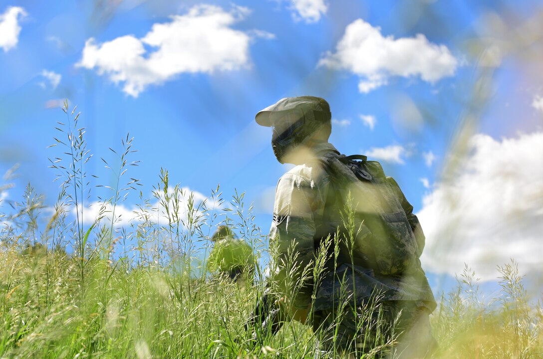 An Airman assigned to the 28th Civil Engineer Squadron participates in a land navigation exercise at a South Dakota National Guard training site June 19, 2017. The exercise was part of an urban tactics training during annual exercise Golden Coyote. (U.S. Air Force photo by Senior Airman James L. Miller)