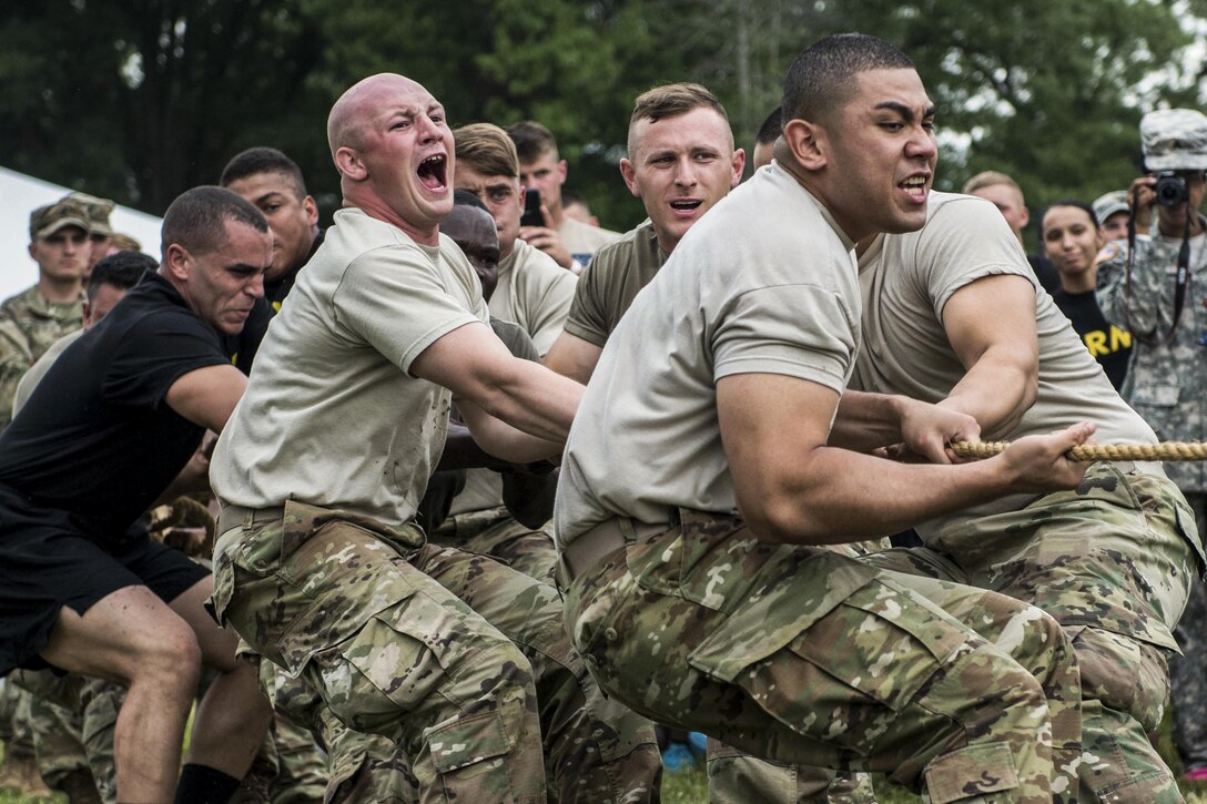 Soldiers and Marines compete in a tug-of-war challenge during the 4th annual Urban Warrior Challenge at Joint Base Myer-Henderson Hall, Va., June 22, 2017. The competition builds team cohesion and camaraderie. Army Photo by Sgt. George Huleyy