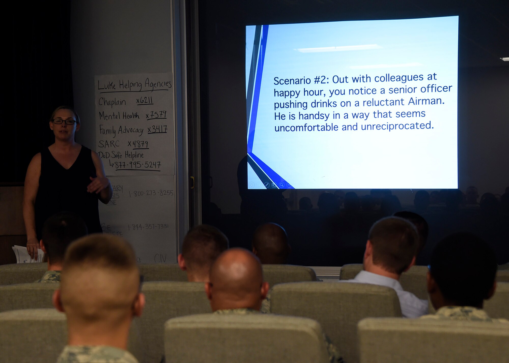 Senior Master Sgt. Terri Reppe, 607th Air Control Squadron operations superintendent, briefs Airmen during Green Dot training June 23, 2017 at Luke Air Force Base, Ariz. The Air Force Green Dot training began in 2016 and helps prepare organizations to implement a strategy of violence prevention that can reduce power-based interpersonal violence. (U.S. Air Force photo by Senior Airman Devante Williams) 