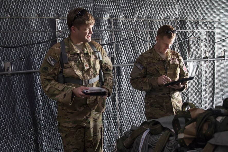 A member with the 353rd Special Operations Group gives a pre-flight briefing on a U.S. Air Force MC-130H Combat Talon II at Yokota Air Base, Japan, June 15, 2017, during Exercise Teak Jet. Exercise Teak Jet is a joint combined exchange training (JCET) focused on improving interoperability between the U.S. Air Force and Japan Air Self-Defense Force. (U.S. Air Force photo by Yasuo Osakabe)