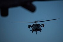 A Japan Air Self-Defense Force UH-60J Black Hawk helicopter assigned to the Hamamatsu Air Rescue Squadron approaches a U.S. Air Force MC-130H Combat Talon II assigned to the 353rd Special Operations Group during helicopter air-to-air refueling training over the Pacific Ocean, June 15, 2017. The 353rd SOG conducted a 10-day long joint combined exchange training exercise with JASDF rescue squadrons. (U.S. Air Force photo by Yasuo Osakabe)