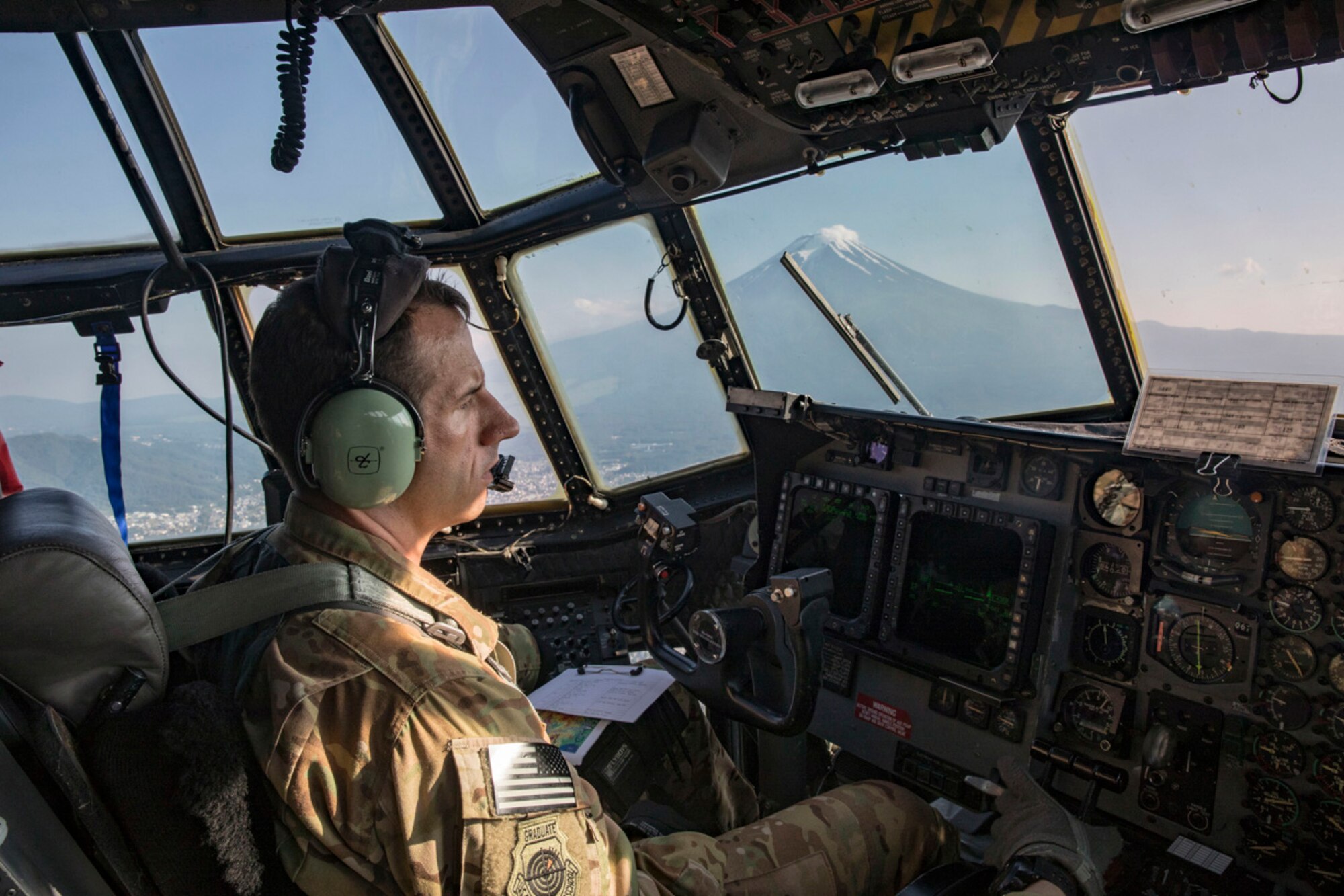 A pilot from the 353rd Special Operations Group flies near Mount Fuji, Japan, June 19, 2017, during Exercise Teak Jet. Exercise Teak Jet is a joint combined exchange training (JCET) focused on improving interoperability between the U.S. Air Force and Japan Air Self-Defense Force. (U.S. Air Force photo by Yasuo Osakabe)