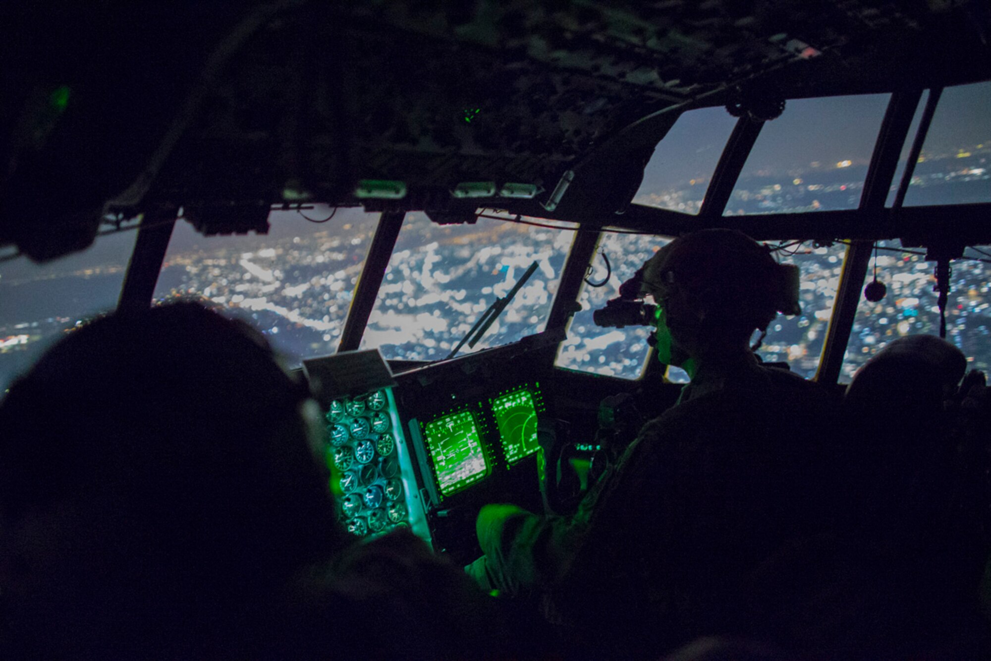 U.S. Air Force MC-130H Combat Talon II crew members from the 353rd Special Operations Group fly over the Kanto Plain, Japan, June 19, 2017, during Exercise Teak Jet. Exercise Teck Jet is a joint combined exchange training (JCET) focused on improving interoperability between U.S. Air Force and Japan Air Self-Defense Force. (U.S. Air Force photo by Yasuo Osakabe)