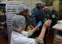 170623-N-YM720-047
PORTLAND, Ore. (June 23, 2017) - Sailors from the submarine tender USS Frank Cable (AS 40) receive instructions from an employee at Meals on Wheels resource center in Portland, June 23.  The Sailors volunteered in the kitchen to help prepare food, package the meals, clean dishes and other various tasks.  Frank Cable is in Portland, Ore. for a scheduled dry-dock phase maintenance availability. (U.S. Navy photo by Mass Communication Specialist 2nd Class Allen Michael McNair/Released)
