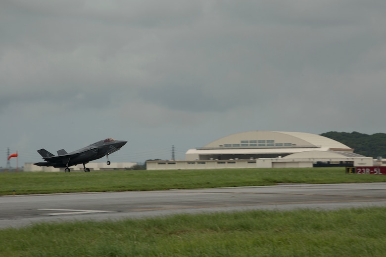 A U.S. Marine Corps F-35B Lightning II aircraft with Marine Fighter Attack Squadron 121, Marine Aircraft Group 12, 1st Marine Aircraft Wing, conducted a training flight from Marine Corps Air Station Iwakuni to Kadena Air Force Base, Okinawa, Japan, June 26, 2017. The Marines with VMFA- 121 worked alongside Airmen with the 18th Wing. This event marked the first time an F-35B Lightning II landed in Okinawa. (U.S. Marine Corps photo by Lance Cpl. Charles Plouffe)