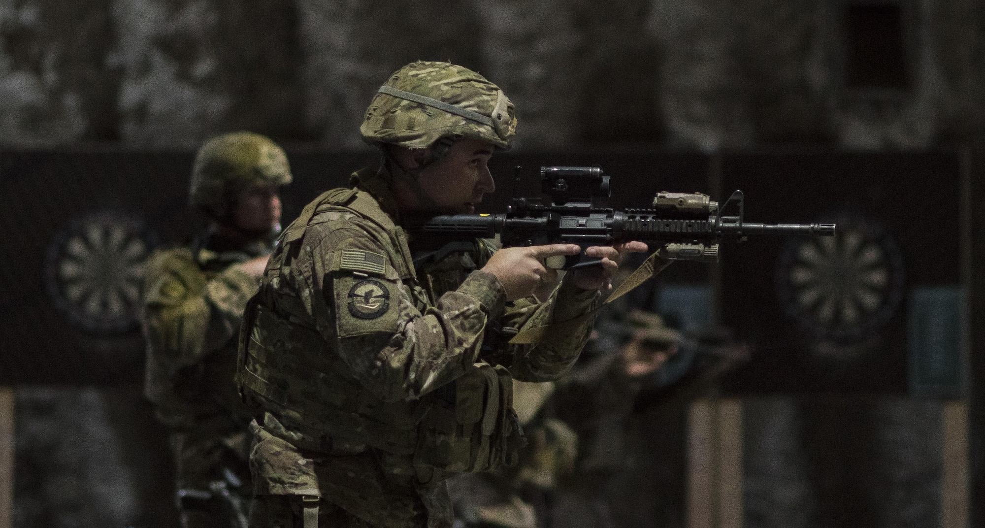 Members of the 332nd Expeditionary Security Forces Squadron clear a building during an active-shooter exercise June 8, 2017, in Southwest Asia. The purpose of the exercise was to evaluate the squadron’s ability to respond to an emergency and improve tactics in a simulated environment. (U.S. Air Force photo/Senior Airman Damon Kasberg) 