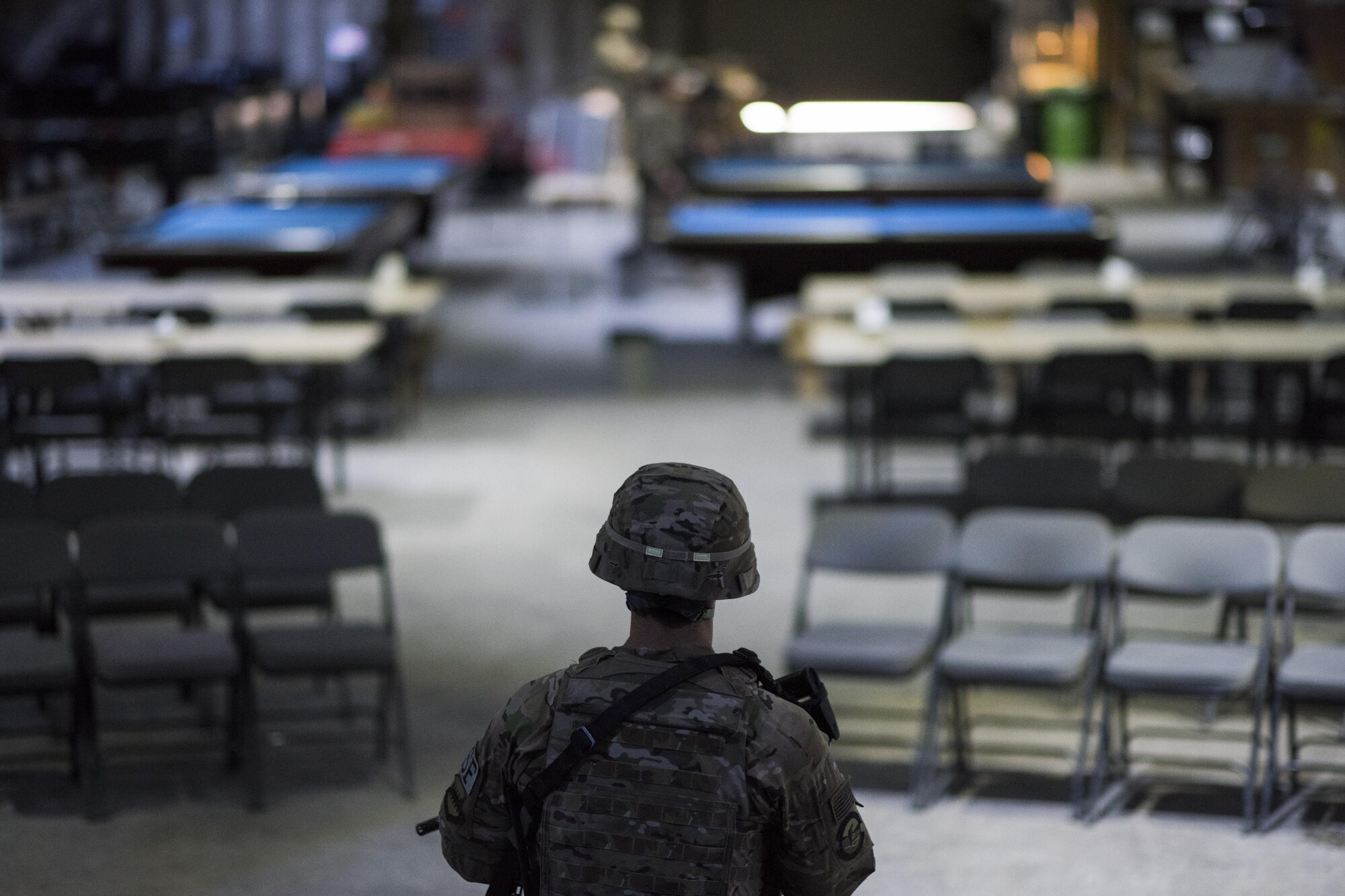 A member of the 332nd Expeditionary Security Forces Squadron stands ready during an active-shooter exercise June 8, 2017, in Southwest Asia. The purpose of the exercise was to evaluate the squadron’s ability to respond to an emergency and improve tactics in a simulated environment. (U.S. Air Force photo/Senior Airman Damon Kasberg) 