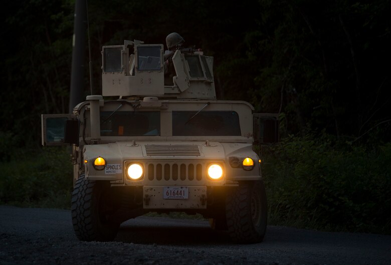 U.S. Marines assigned to Marine Wing Support Squadron (MWSS) 171, based out of Marine Corps Air Station Iwakuni, post security during a security patrol while participating in exercise Eagle Wrath 2017 at Combined Arms Training Center Camp Fuji, Japan, June 16, 2017. Eagle Wrath 2017 is a two-week training evolution focusing on air base ground defense, establishing forward operating bases and forward arming and refueling points in an austere environment as a way to support Marine Aircraft Group 12. (U.S. Marine Corps photo by Lance Cpl. Stephen Campbell)