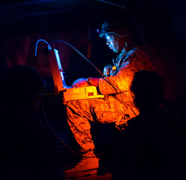 U.S. Marine Corps Staff Sgt. Nijal Dunn, an explosive ordnance disposal technician with Marine Wing Support Squadron (MWSS) 171, based out of Marine Corps Air Station Iwakuni, investigates a potential improvised explosive device during exercise Eagle Wrath 2017 at Combined Arms Training Center Camp Fuji, Japan, June 16, 2017. Eagle Wrath 2017 is a two-week training evolution focusing on air base ground defense, establishing forward operating bases and forward arming and refueling points in an austere environment as a way to support Marine Aircraft Group 12. (U.S. Marine Corps photo by Lance Cpl. Stephen Campbell)