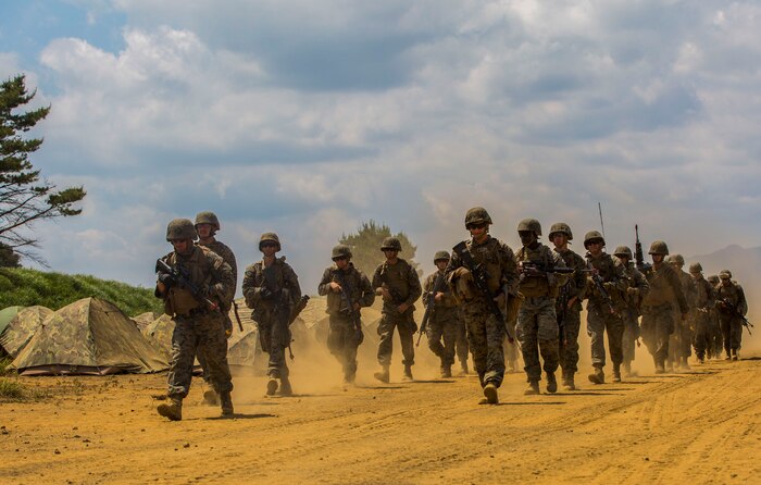U.S. Marines assigned to Marine Wing Support Squadron (MWSS) 171, based out of Marine Corps Air Station Iwakuni, conduct a security patrol during exercise Eagle Wrath 2017 at Combined Arms Training Center Camp Fuji, Japan, June 17, 2017. Eagle Wrath 2017 is a two-week training evolution focusing on air base ground defense, establishing forward operating bases and forward arming and refueling points in an austere environment as a way to support Marine Aircraft Group 12. (U.S. Marine Corps photo by Lance Cpl. Stephen Campbell)