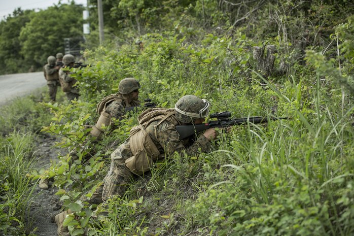 U.S. Marines assigned to Marine Wing Support Squadron (MWSS) 171, based out of Marine Corps Air Station Iwakuni, provide security during a patrol while participating in exercise Eagle Wrath 2017 at Combined Arms Training Center Camp Fuji, Japan, June 17, 2017. Eagle Wrath 2017 is a two-week training evolution focusing on air base ground defense, establishing forward operating bases and forward arming and refueling points in an austere environment as a way to support Marine Aircraft Group 12. (U.S. Marine Corps photo by Lance Cpl. Stephen Campbell)