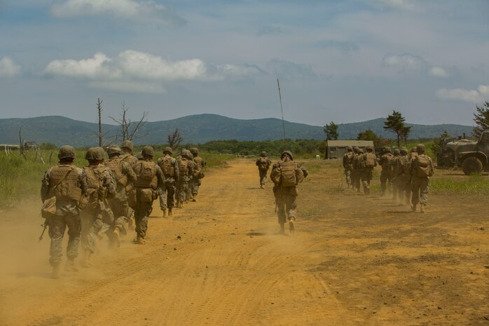 U.S. Marines assigned to Marine Wing Support Squadron (MWSS) 171, based out of Marine Corps Air Station Iwakuni, go out on a security patrol during exercise Eagle Wrath 2017 at Combined Arms Training Center Camp Fuji, Japan, June 17, 2017. Eagle Wrath 2017 is a two-week training evolution focusing on air base ground defense, establishing forward operating bases and forward arming and refueling points in an austere environment as a way to support Marine Aircraft Group 12. (U.S. Marine Corps photo by Lance Cpl. Stephen Campbell)