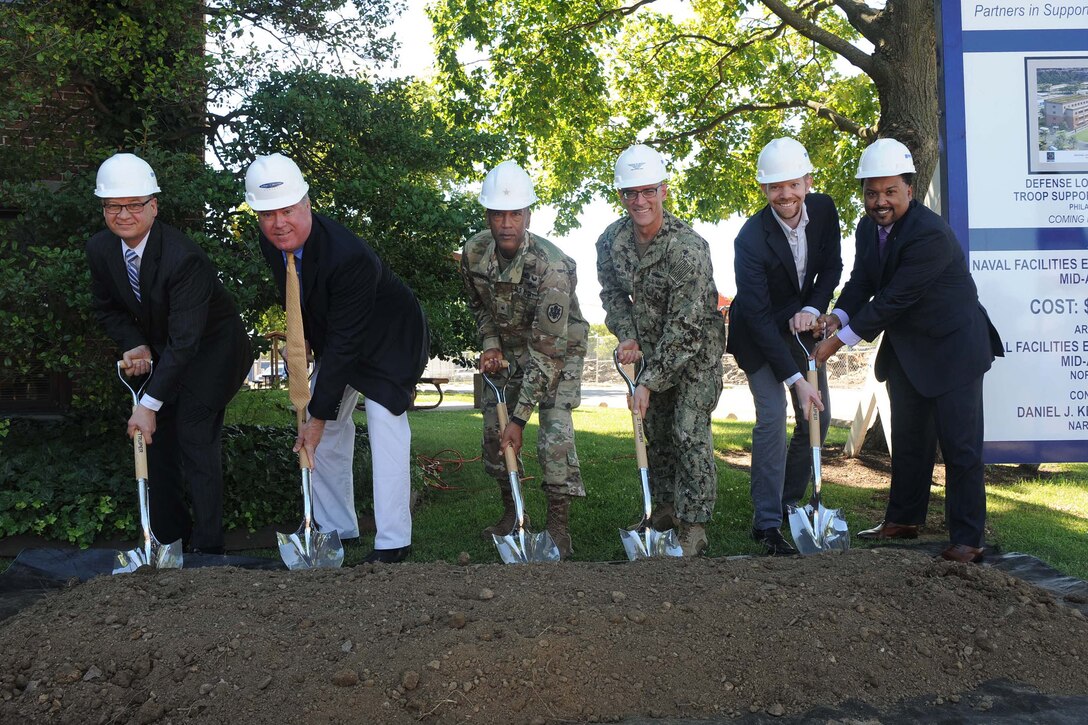 DLA Troop Support hosted a groundbreaking ceremony June 26 to mark the start of construction on a new headquarters building on NSA Philadelphia. Pictured from left to right are: Richard Ellis, DLA Troop Support deputy commander, Tom Broadhurst, Daniel J. Keating Company vice president of operations; Army Brig. Gen. Charles Hamilton, DLA Troop Support commander; Navy Capt. Rudy Geisler, NSA Mechanicsburg-Philadelphia commander; Andrew Dalzell, representing Pennsylvania state Representative Jared Solomon; and Anthony Luker, from the office of Congressman Brendan Boyle. 