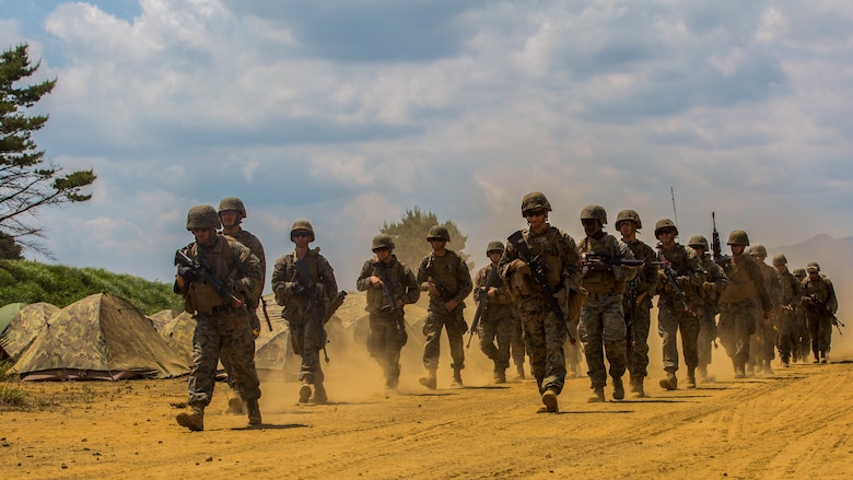 U.S. Marines assigned to Marine Wing Support Squadron (MWSS) 171, based out of Marine Corps Air Station Iwakuni, conduct a security patrol during exercise Eagle Wrath 2017 at Combined Arms Training Center Camp Fuji, Japan, June 17, 2017. Eagle Wrath 2017 is a two-week training evolution focusing on air base ground defense, establishing forward operating bases and forward arming and refueling points in an austere environment as a way to support Marine Aircraft Group 12. (U.S. Marine Corps photo by Lance Cpl. Stephen Campbell)