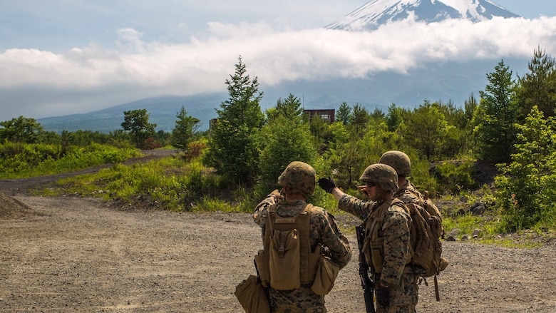 U.S. Marines assigned to Marine Support Squadron (MWSS) 171, based out of Marine Corps Air Station Iwakuni, identify a potential improvised explosive device while on a security patrol during exercise Eagle Wrath 2017 at Combined Arms Training Center Camp Fuji, Japan, June 17, 2017. Eagle Wrath 2017 is a two-week training evolution focusing on air base ground defense, establishing forward operating bases and forward arming and refueling points in an austere environment as a way to support Marine Aircraft Group 12. (U.S. Marine Corps photo by Lance Cpl. Stephen Campbell)