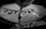 A U.S. Air Force B-52 Stratofortress receives fuel from a 340th Expeditionary Air Refueling Squadron KC-135 Stratotanker during a flight in support of Operation Resolute Support June 6, 2017. The 340th EARS, part of U.S. Air Forces Central Command, is responsible for delivering fuel for U.S. and coalition forces, enabling a persistent 24/7 presence in the area of responsibility. (U.S. Air Force photo by Staff Sgt. Trevor T. McBride)