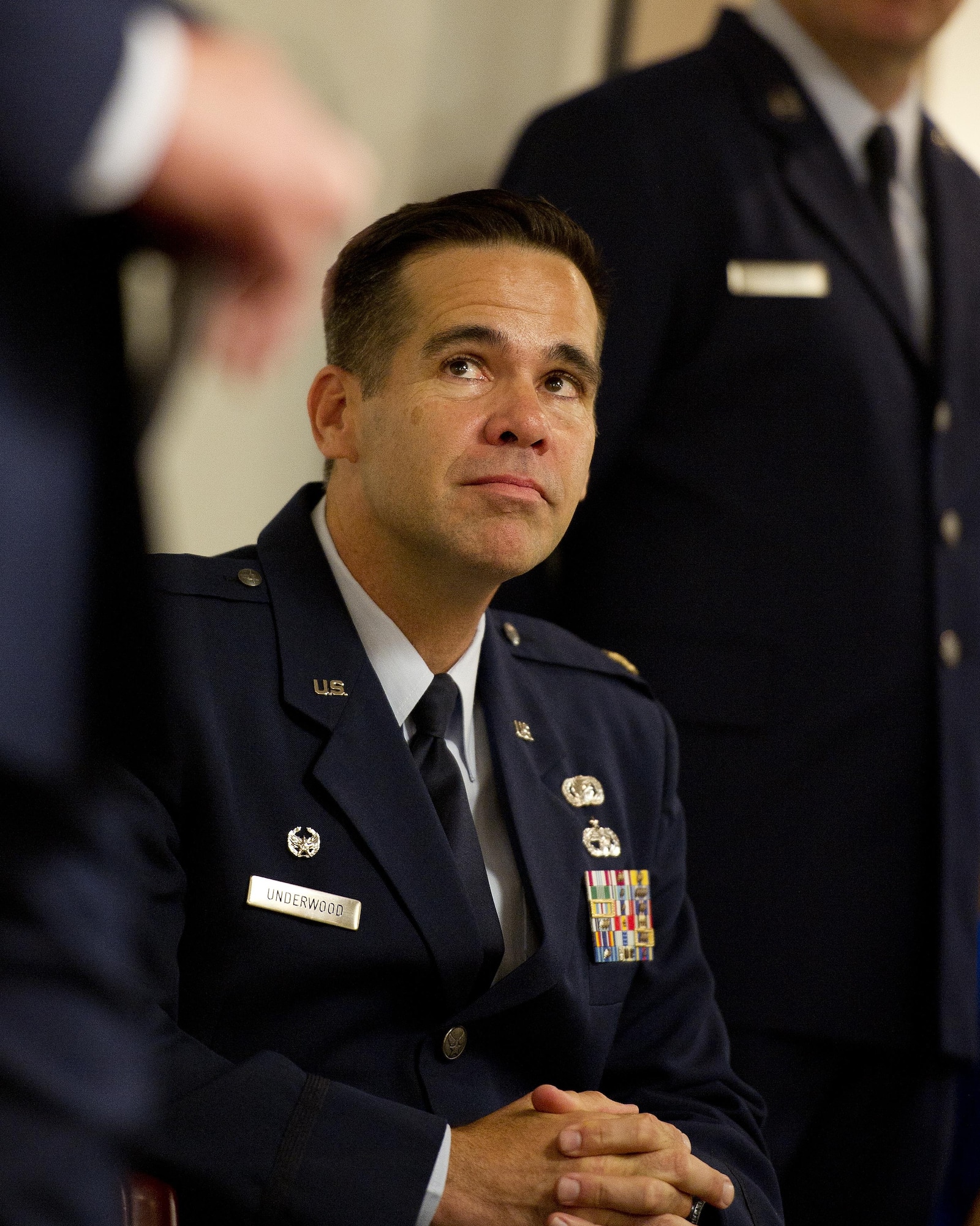 U.S. Air Force Maj. Hamilton Underwood listens to opening remarks given by Lt. Col. John Robinson, commander of the 315th Operations Group, before he assumes command of the newly activated 4th Combat Camera Squadron at Joint Base Charleston, South Carolina, May 5, 2017. The 4th CTCS was reactivated in South Carolina after being deactivated August 2015 in California. (U.S. Air Force photo by Tech. Sgt. Stephen D. Schester) 
