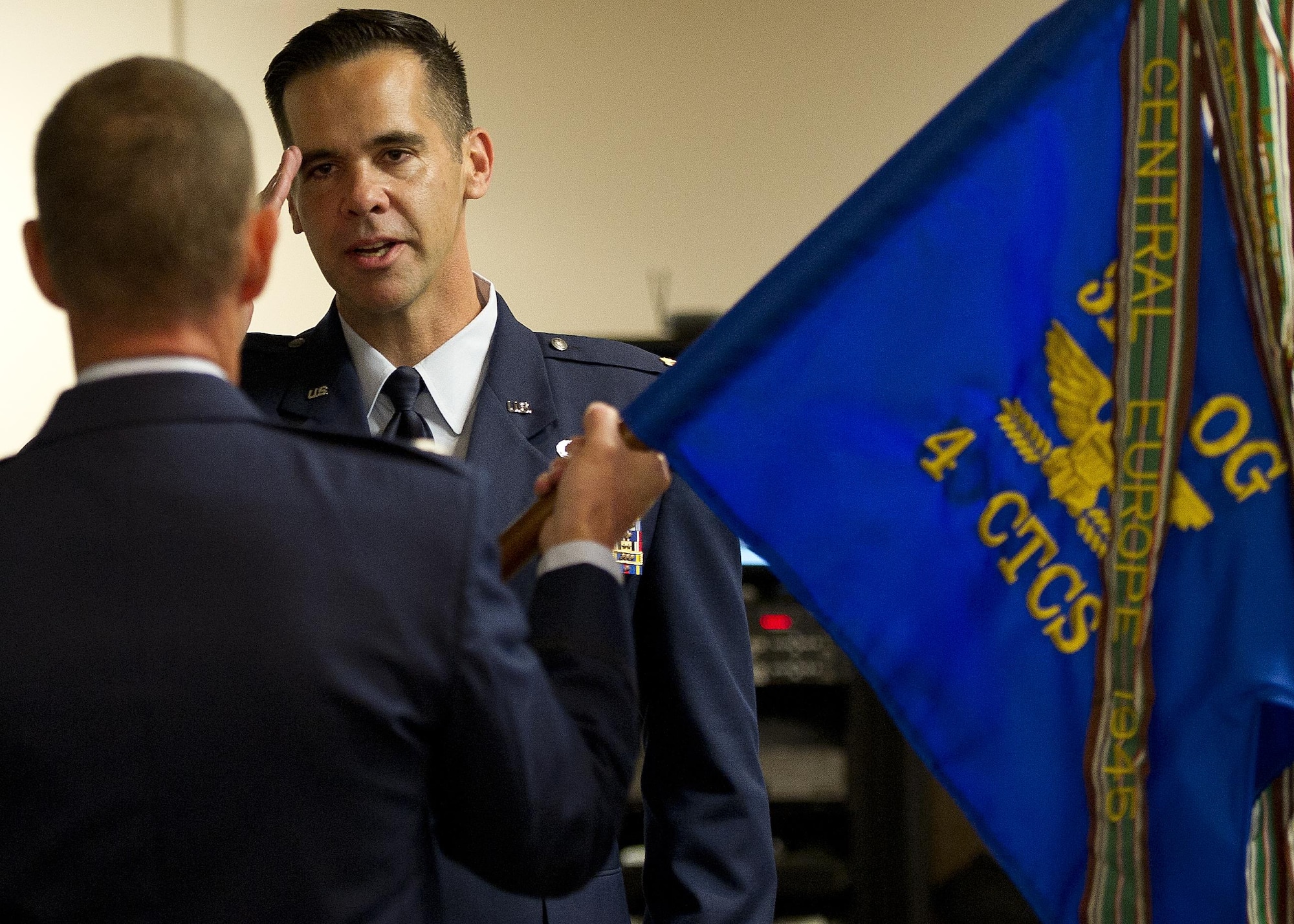 U.S. Air Force Maj. Hamilton Underwood salutes U.S. Air Force Lt. Col. John Robinson, commander of the 315th Operations Group, before taking command of the newly activated 4th Combat Camera Squadron at Joint Base Charleston, South Carolina, May 5, 2017. The 4th CTCS was reactivated in South Carolina after being deactivated August 2015 in California. (U.S. Air Force photo by Tech. Sgt. Stephen D. Schester) 