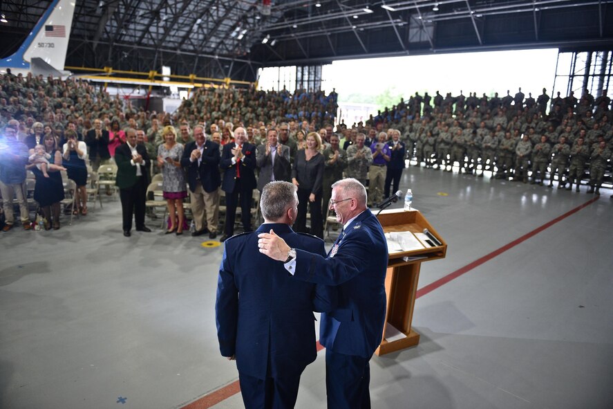 At left, Maj. Gen. John Flournoy congratulates the outgoing commander of the 932nd Airlift Wing, Col. Jonathan Philebaum, as he thanked his family and the wing, and retired on June 3, 2017, at Scott Air Force Base, Illinois. Friends and family from around the nation came to the 932nd Airlift Wing "Gateway Wing", to see the retiring commander's last day, and to honor and thank him for more than 31 years of faithful service to the United States Air Force and Air Force Reserve Command. (U.S. Air Force photo by Tech. Sgt. Christopher Parr)