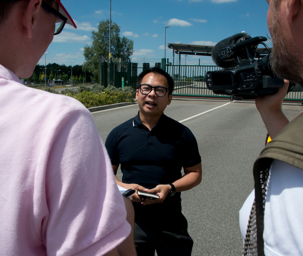 Capt. Jeku Arce, 221st Public Affairs Detachment Commander, talks with media role-players during an active shooter scenario as part of U.S. Army Garrison Rhineland-Pfalz's annual exercise Warrior Response 17 on June 24 in Kaiserslautern, Germany (U.S. Army photo by Richard Bumgardner).