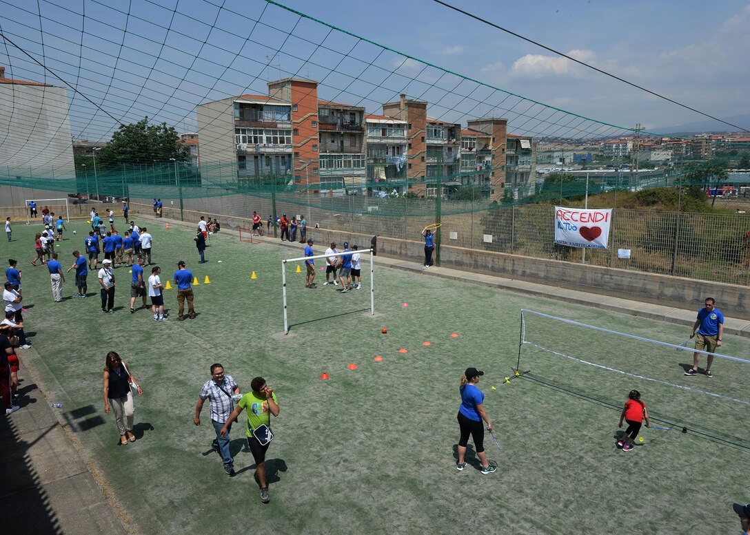 Volunteers and participants play a variety of sports games during a Special Olympics event in Catania, Sicily, June 7, 2017. The event’s sports lineup included soccer, basketball, badminton, and field hockey. (U.S. Air Force photo by Senior Airman Jimmie D. Pike)