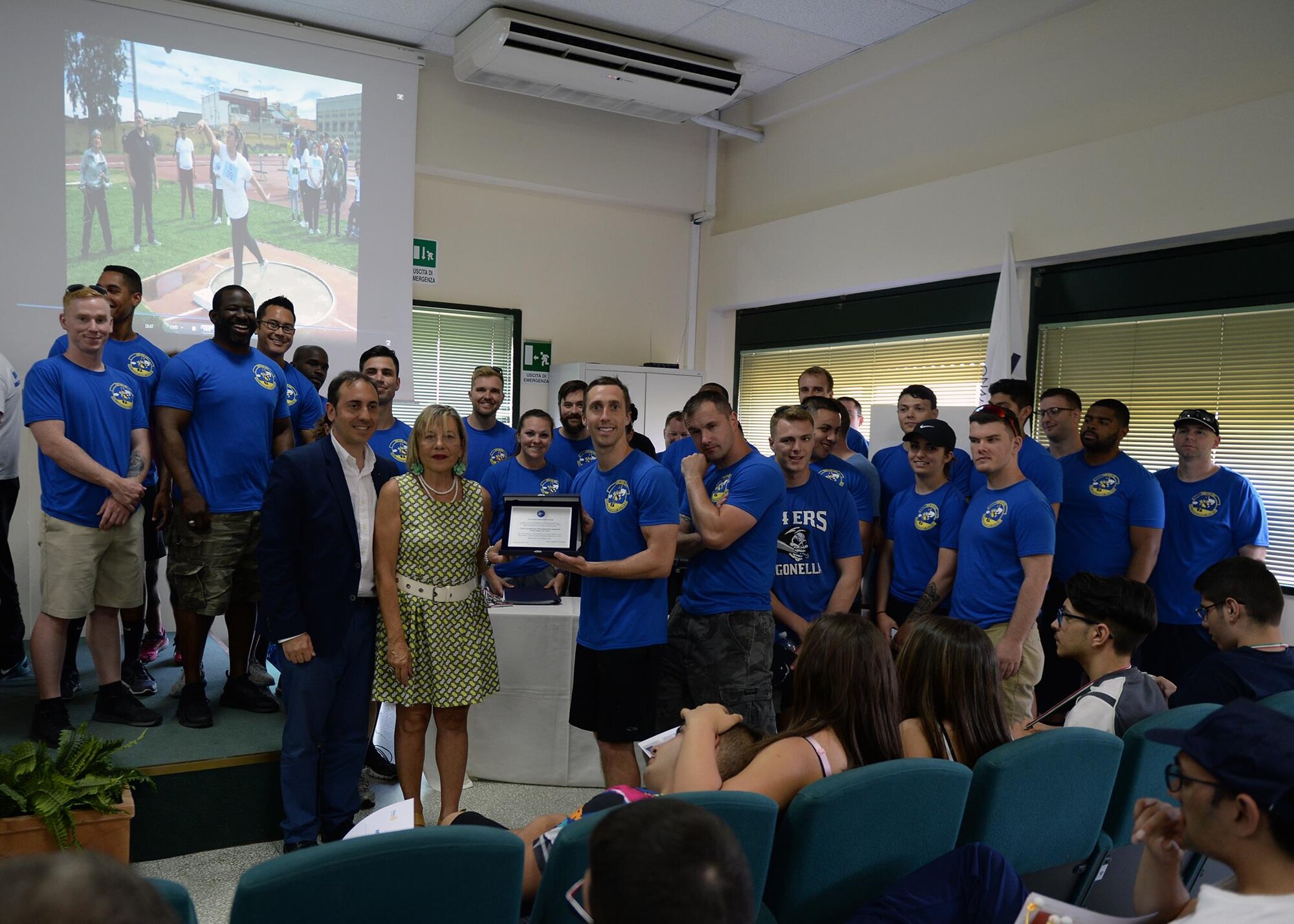Airmen deployed to the 324th Expeditionary Reconnaissance Squadron pose for a photo in Cantania, Sicily, June 7, 2017. The Airmen were recognized for their success in coordinating the first ever Special Olympics even held in the area. (U.S. Air Force photo by Senior Airman Jimmie D. Pike)