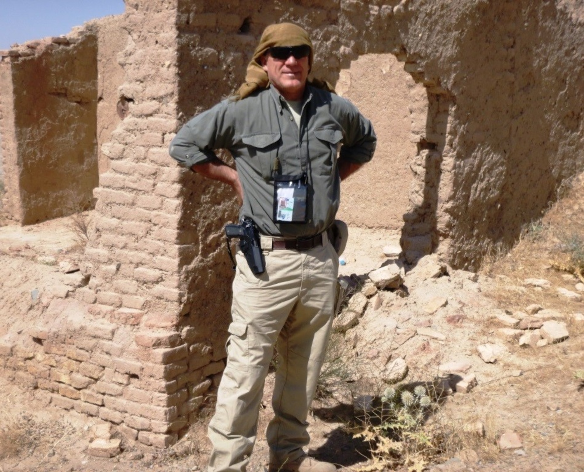 Greg Gangnuss, a civil engineer who worked as a senior environmental adviser to the Afghan Ministry of Defense, is shown in the field during his March 2015 to April 2016 deployment to Afghanistan. (Courtesy Photo)