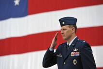 Lt. Col. David Gallagher renders his first salute to members of the 50th Operations Support Squadron after assuming command Monday, June 26, 2017 at Schriever Air Force Base, Colorado. The 50 OSS leads operational training programs and policies to ensure combat readiness for the DoD's largest satellite wing with hundreds of operators and multiple operational squadrons operating 70 satellites worth more than $50 billion. . (U.S. Air Force Photo/Dennis Rogers)