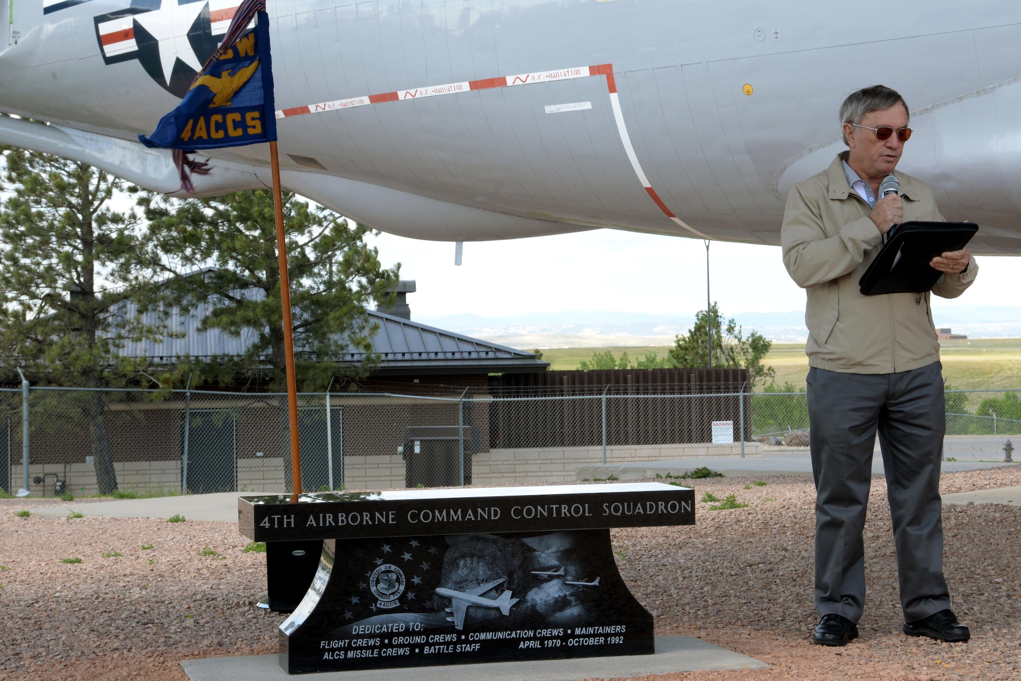 Retired Lt. Col. Richard Hodges, a former 4th Airborne Command Control Squadron commander, speaks at the 25th anniversary of the deactivation of the 4th ACCS at the South Dakota Air and Space Museum, Box Elder, S.D., June 24, 2017. During its nearly 23-year run, the squadron provided an airborne and auxiliary command post and a communications link for 15th Air Force and Strategic Air Command. (U.S. Air Force photo by Staff Sgt. Hailey Staker)