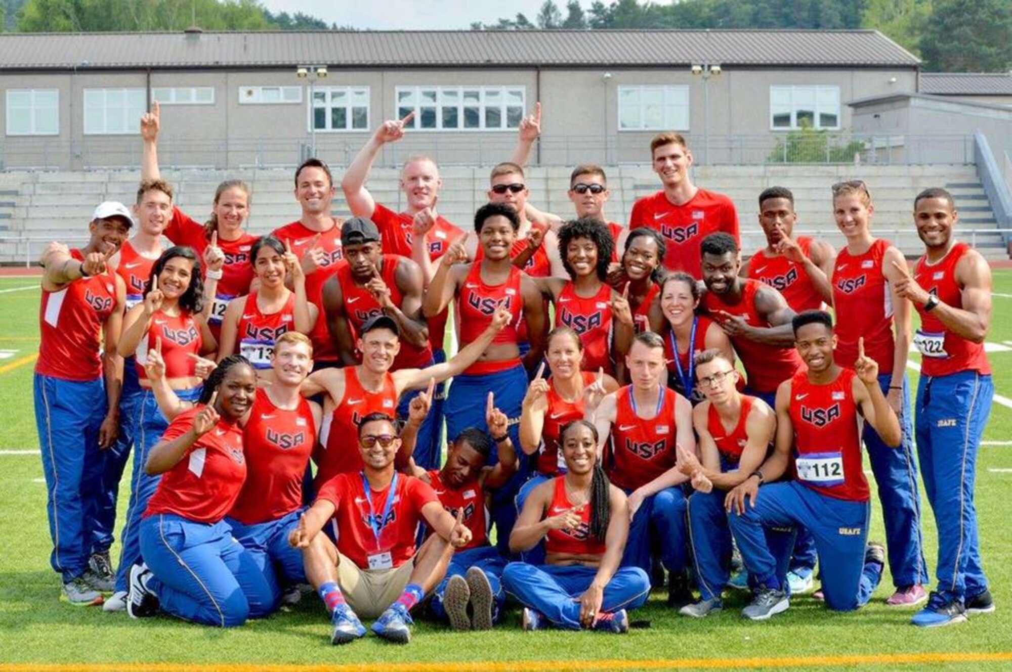 Athletes representing the U.S. Air Force pose for a team photo after the conclusion of the Allied Air Command Inter-Nation Athletics Championship on Vogelweh Military Complex, Germany, June 21, 2017. Both the men’s and women’s teams for the U.S. won over six other countries’ representatives to take first place in the competition. (Photo courtesy of Staff Sgt. Emesh Fernando)