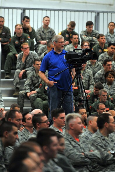 Kevin Schwandt, 55th Wing Public Affairs videographer, records a commander's call as part of the PA Command Information team. PA Command Information has many responsibilites that involve informing the base population, their families and the general public. (U.S. Air Force photo by Josh Plueger)