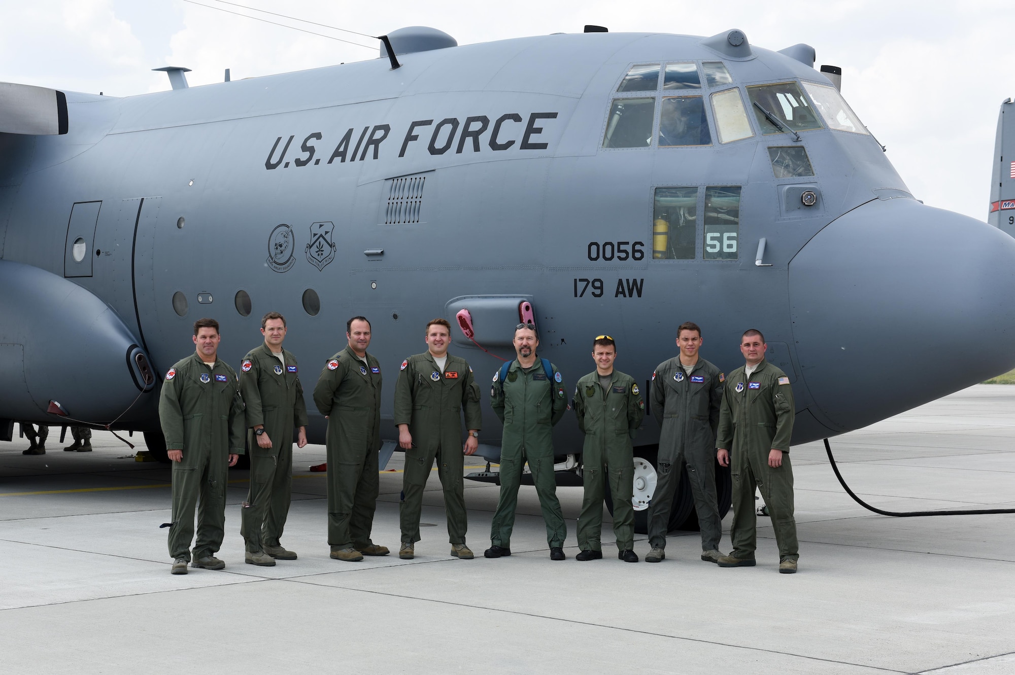 Aircrew members assigned to the Ohio Air National Guard’s 179th Airlift Wing stand with two Hungarian Air Force Pilots after an orientation flight on a C-130 Hercules during Exercise Load Diffuser, in Kecskemet, Hungary, on June 6. The Ohio National Guard has a two-decade long partnership with Hungary through the National Guard’s State Partnership Program, and orientation flights are another way to build relationships and enhance training with our allied nation, Hungary.