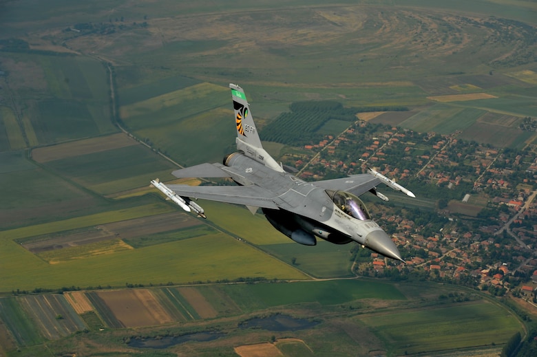 An F-16 Fighting Falcon assigned to the 180th Fighter Wing, Ohio Air National Guard, flies over the skies of Hungary, June 6, 2017. More than 400 military members from six countries participated in exercise Load Diffuser 17 at the Hungarian Air Base from May 22 to June 9, 2017. Load Diffuser is a Hungarian Air Force-led, multinational flying exercise between NATO allies and partner nations. Multinational training engagements such as these strengthen our relationships, help us maintain joint readiness and interoperability, and reassure our European allies and partners. The U.S. and Hungary, as NATO allies, share a commitment to promote peace and stability, and seek opportunities to continue developing their relationship. The U.S. and Europe must preserve our mutual commitment and trust as we face emerging malignant forces and evolving strategic assets. Air National Guard photo by Senior Master Sgt. Beth Holliker.