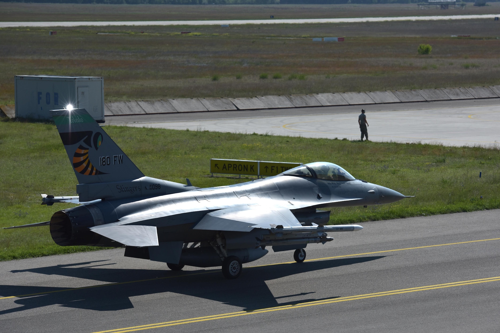 An F-16 Fighting Falcon assigned to the Ohio Air National Guard’s 180th Fighter Wing, taxies at Kecskemet Air Base in Hungary, May 26, 2017. More than 150 Airmen and eight F-16s from the 180FW deployed to the air base to participate in exercise Load Diffuser 17 at the Hungarian Air Base from May 22 to June 9, 2017. Load Diffuser is a Hungarian Air Force-led, multinational flying exercise between NATO allies and partner nations. Multinational training engagements such as these strengthen our relationships, help us maintain joint readiness and interoperability, and reassure our European allies and partners. The U.S. and Hungary, as NATO allies, share a commitment to promote peace and stability, and seek opportunities to continue developing their relationship. Air National Guard photo by Senior Master Sgt. Beth Holliker.