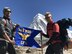 (From left) Airman 1st Class Anish Chauhan and Senior Airman Shane Hoag, both water and fuel systems management journeymen of the 509th Civil Engineer Squadron, stand with the squadron’s guide-on flag at Mount Everest South Base Camp May 20, 2017. They hiked just over 17,500 feet in seven days to reach this base camp of the mountain. Senior Airman Sukh Bhandari, an aerospace ground equipment journeyman of the 509th Maintenance Squadron, also made the hike. (courtesy photo)