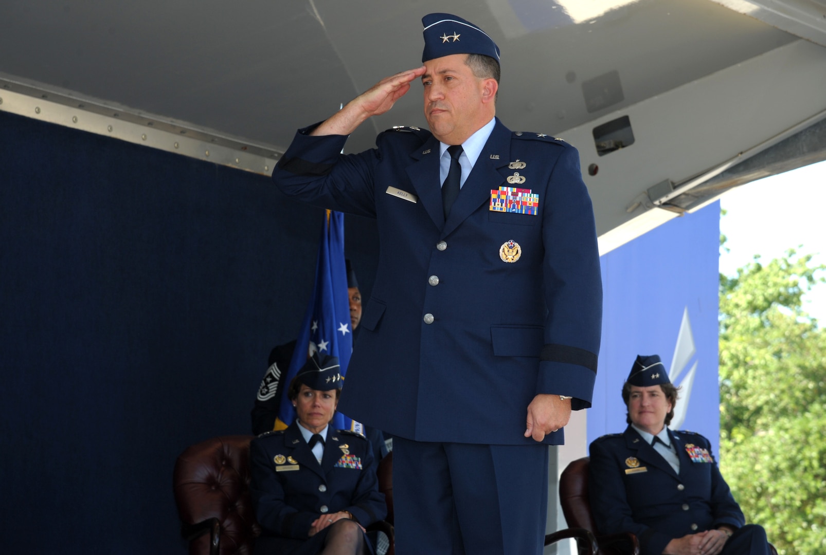 U.S. Air Force Maj. Gen. Brian Kelly, Air Force Personnel Center commander, renders his first salute to a formation representing the AFPC team during an official change of command ceremony June 23 at Joint Base San Antonio-Randolph, Texas. Kelly assumed this role as Maj. Gen. Peggy Poore formally relinquished command after several years of dedicated service.
