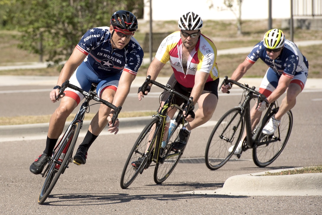 Service members turn while riding bikes during U.S. Special Operations Command’s training camp at MacDill Air Force Base, Fla., May 16, 2017. 